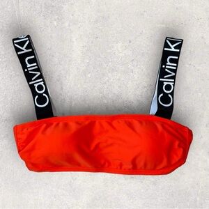 CK neon orange swim top